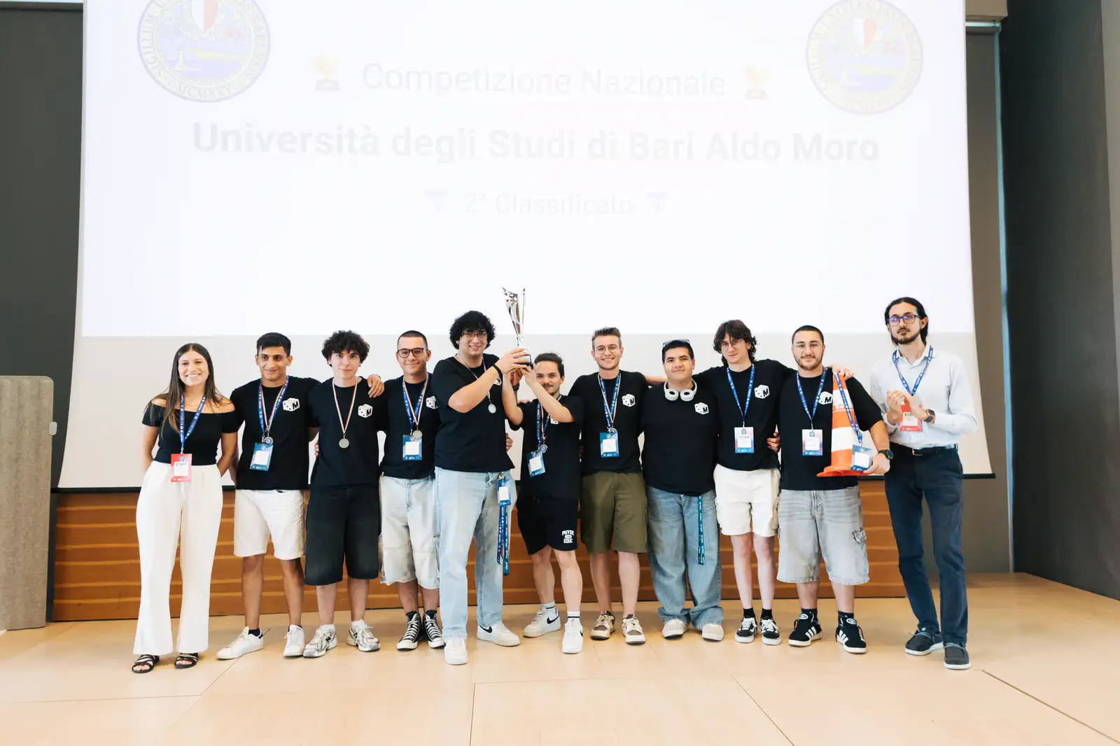 M0NT3C4RL0 celebrating its CyberCup result with the trophy