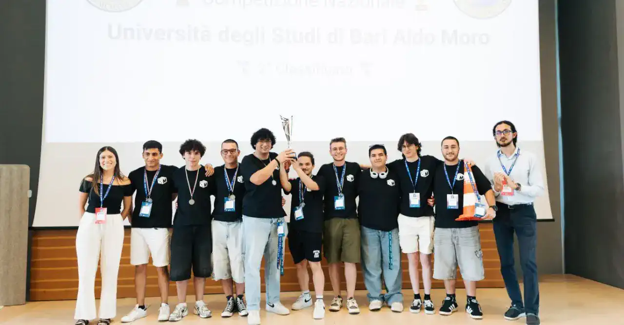 The Mntcrl team with its trophy after the CyberChallenge.IT national competition